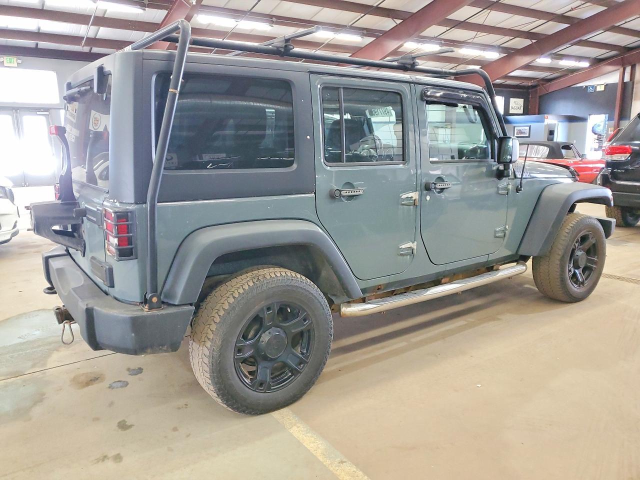 2014 Jeep Wrangler Unlimited Sport - Фото 3