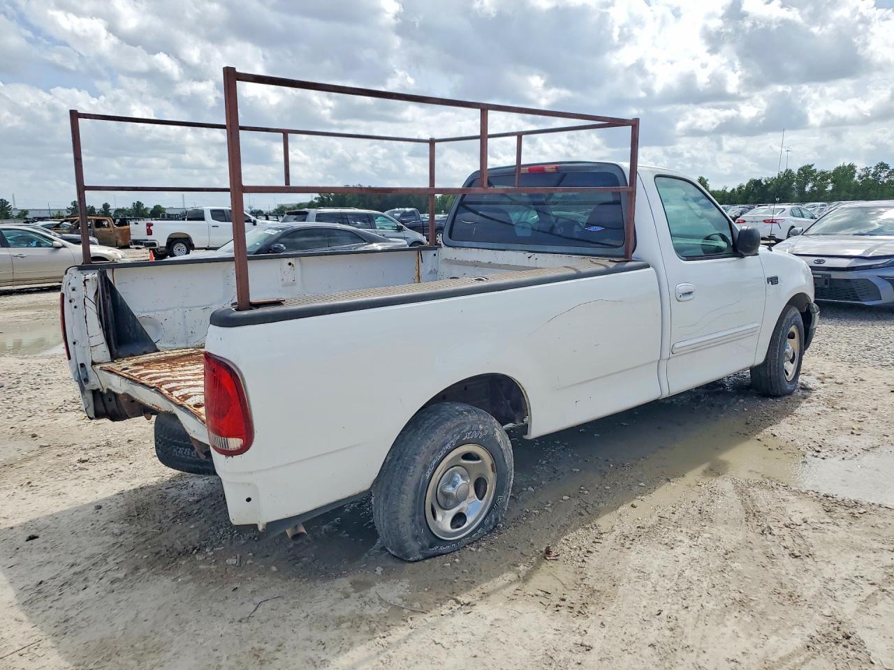 2003 Ford F150 - Фото 3