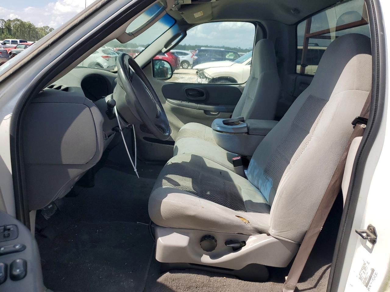 2003 Ford F150 - Фото 7