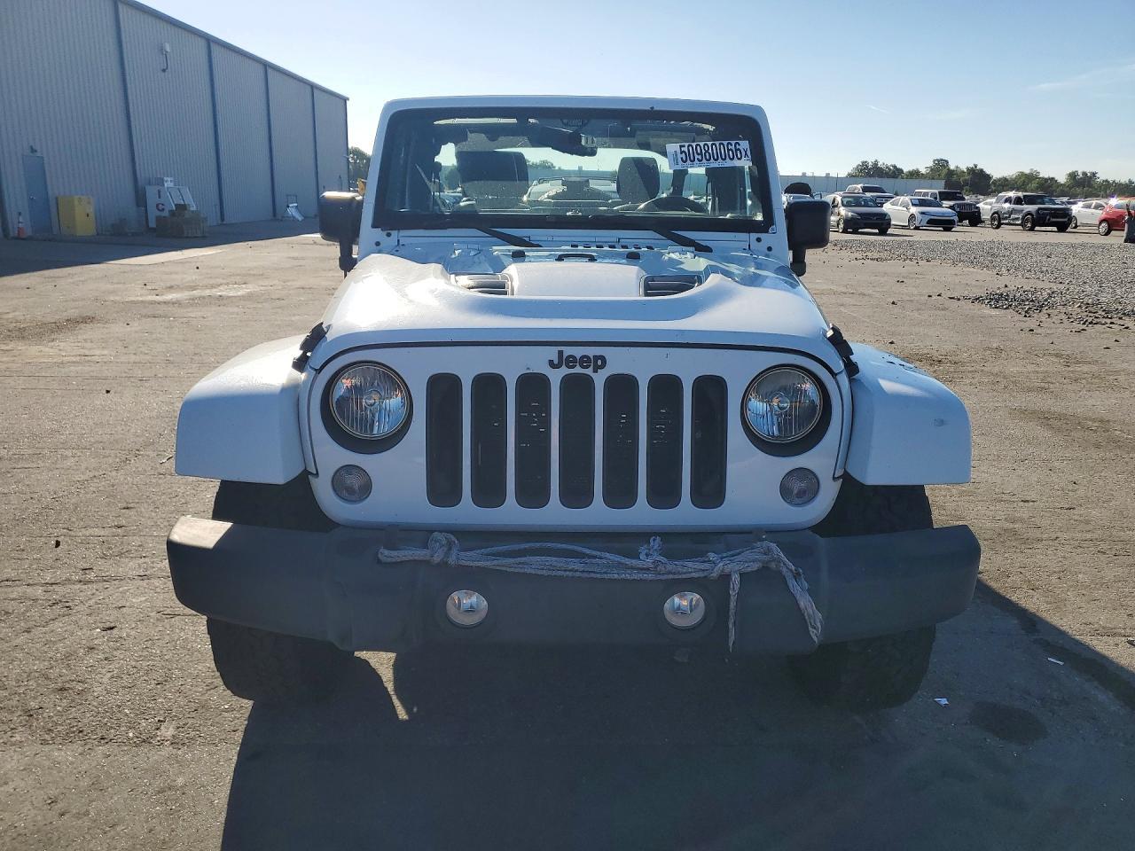 2015 Jeep Wrangler Unlimited Sahara - Фото 5