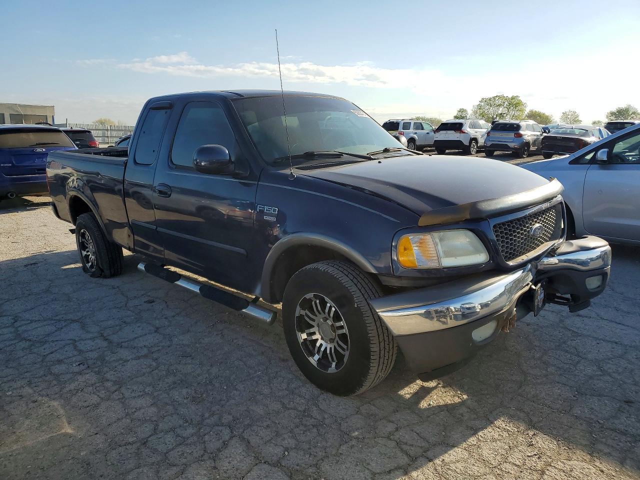 2002 Ford F150 - Фото 4