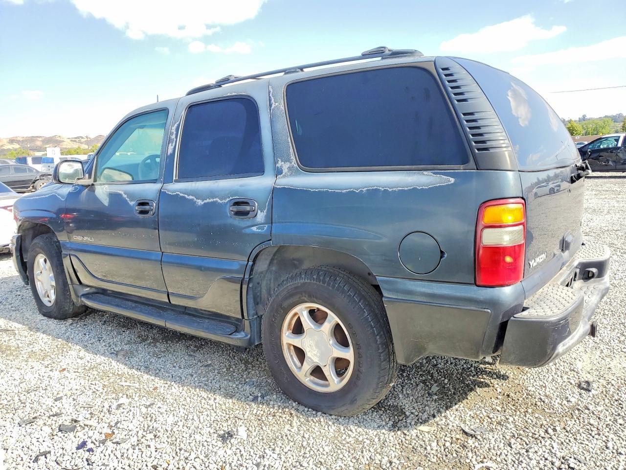 2003 GMC Yukon Denali - Фото 2