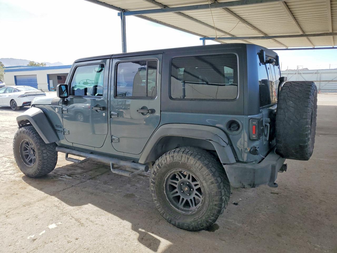 2014 Jeep Wrangler Unlimited Sport - Фото 2