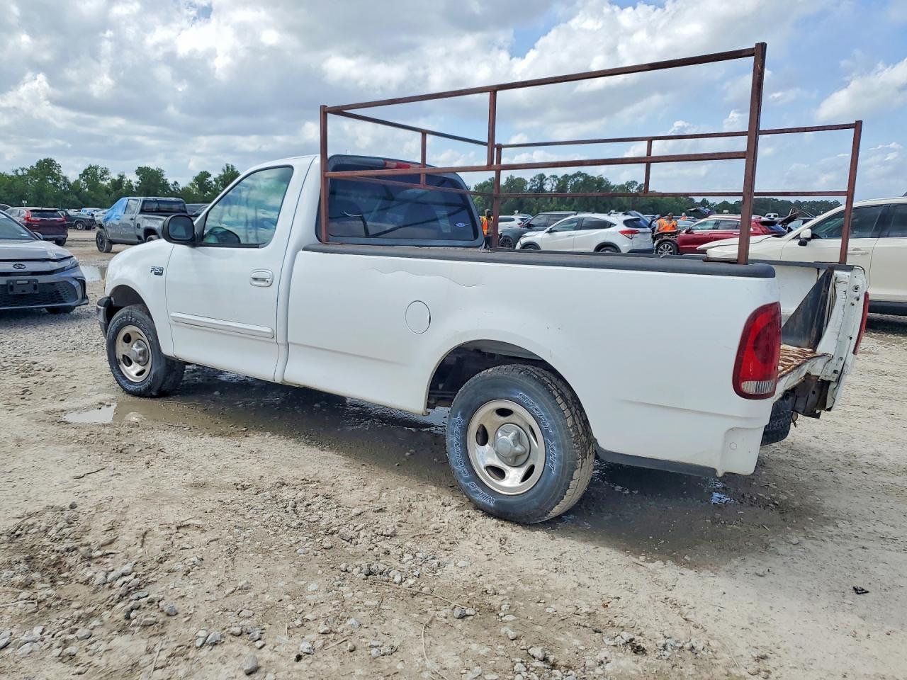 2003 Ford F150 - Фото 2