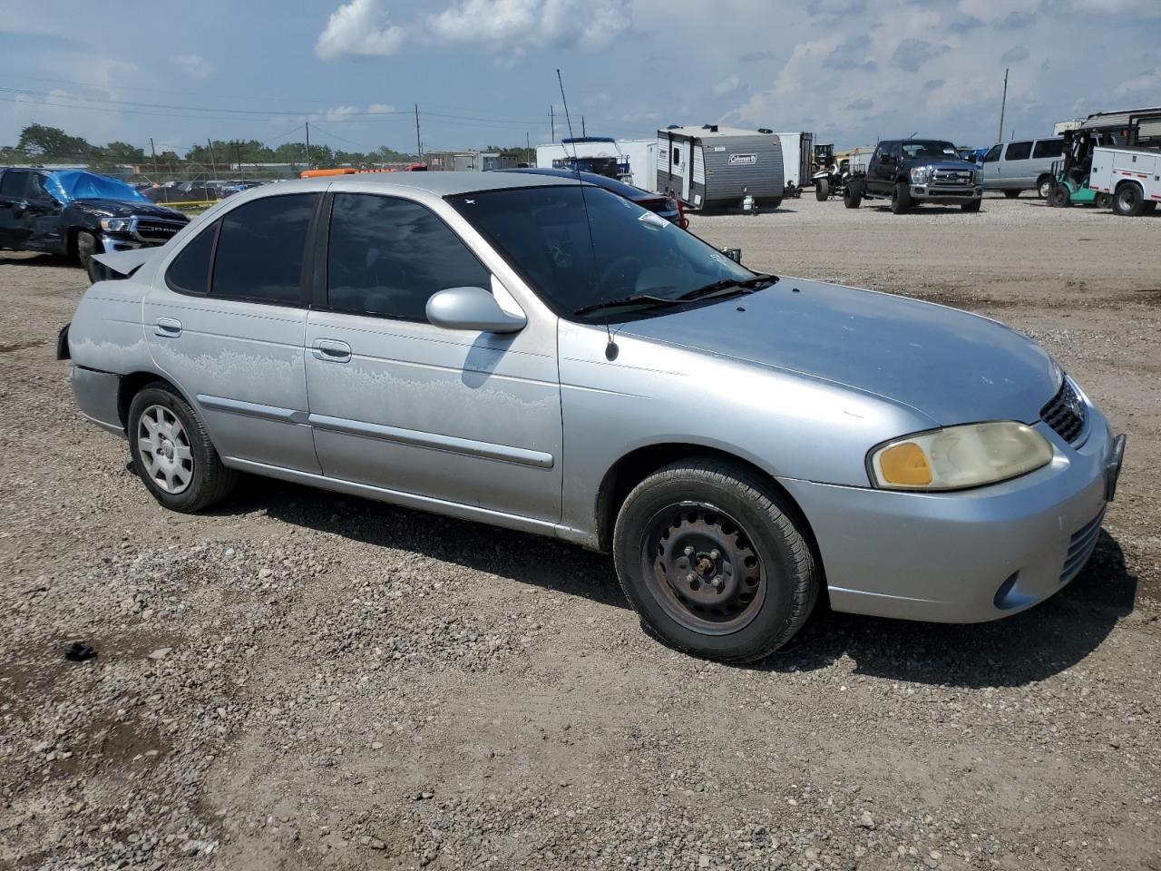 2002 Nissan Sentra Xe - Фото 4