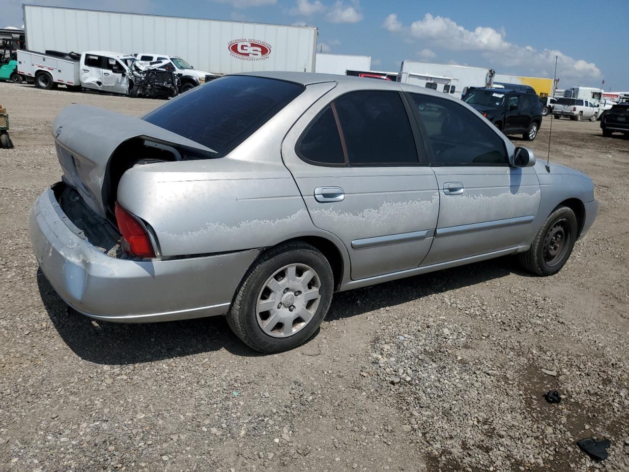 2002 Nissan Sentra Xe - Фото 3