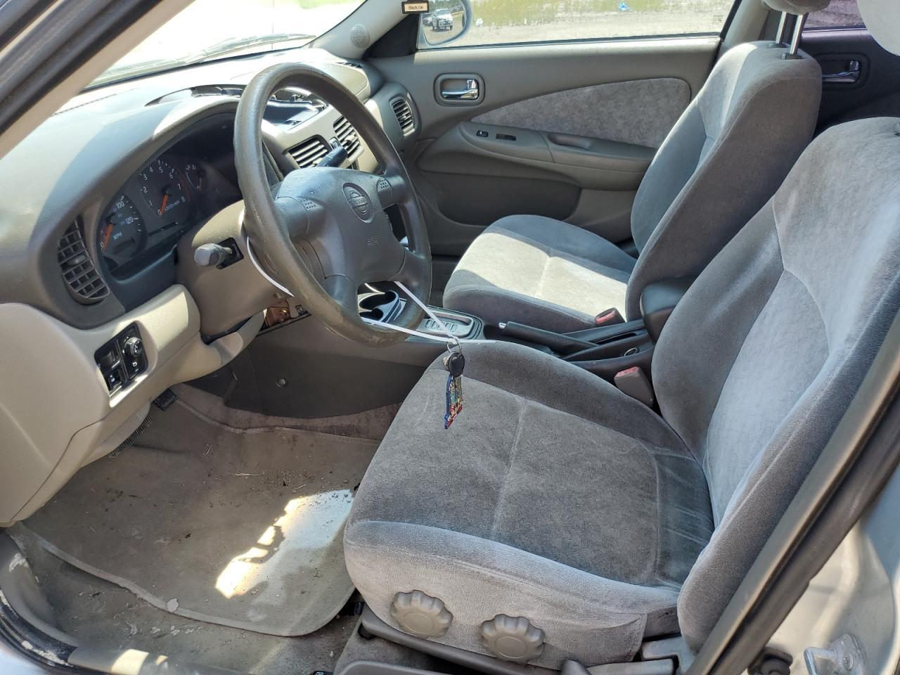 2002 Nissan Sentra Xe - Фото 7