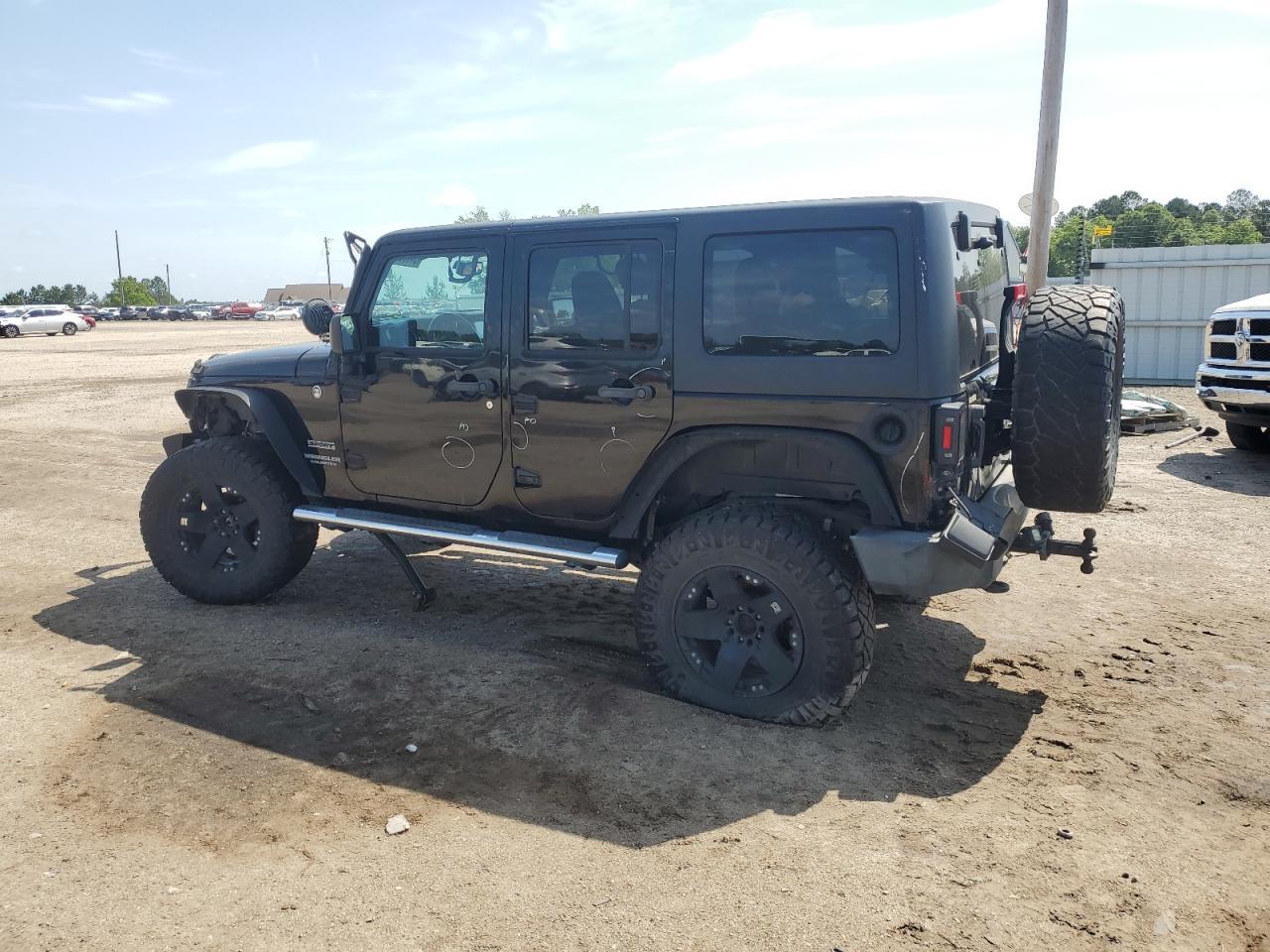 2015 Jeep Wrangler Unlimited Sport - Фото 2