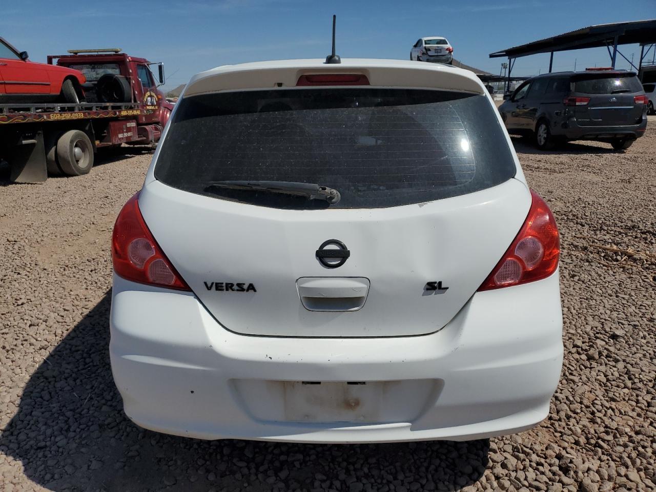 2011 Nissan Versa S - Фото 6