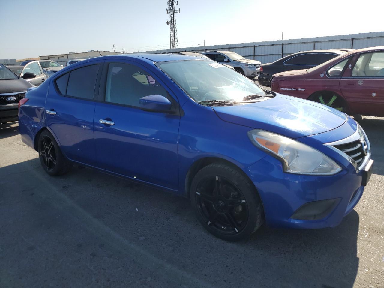 2016 Nissan Versa S - Фото 4