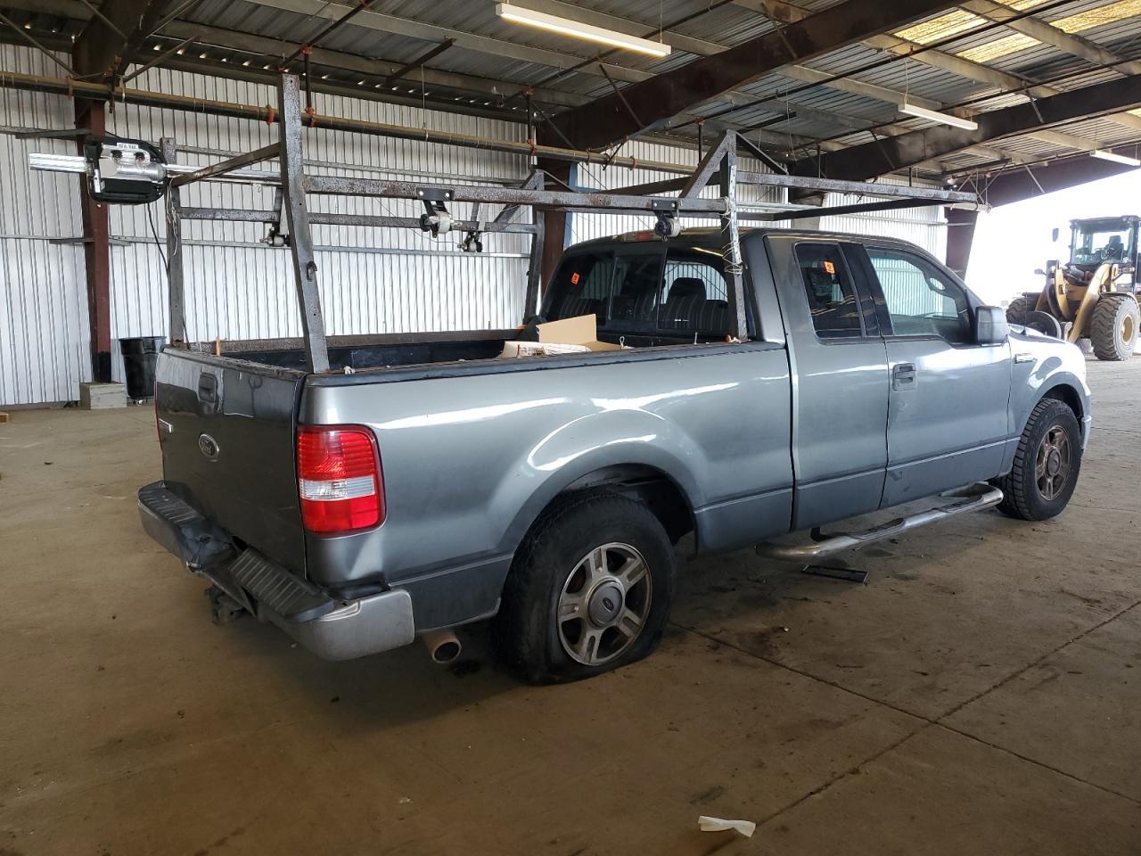 2004 Ford F150 - Фото 3