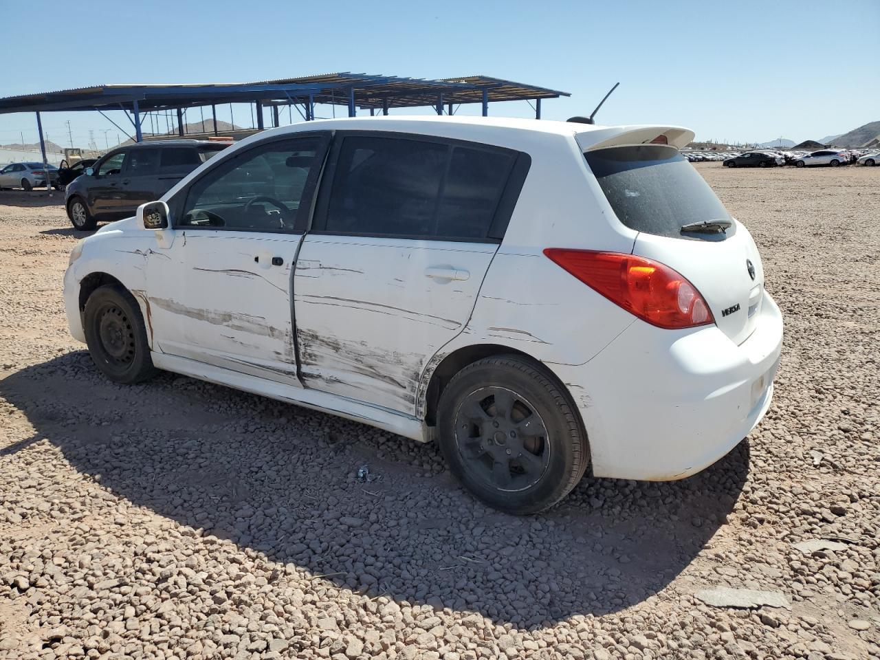 2011 Nissan Versa S - Фото 2