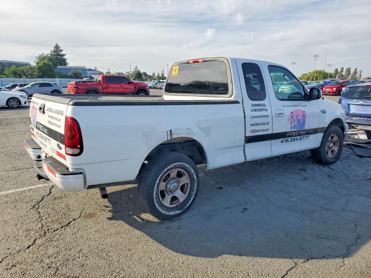 2002 Ford F150 - Фото 3