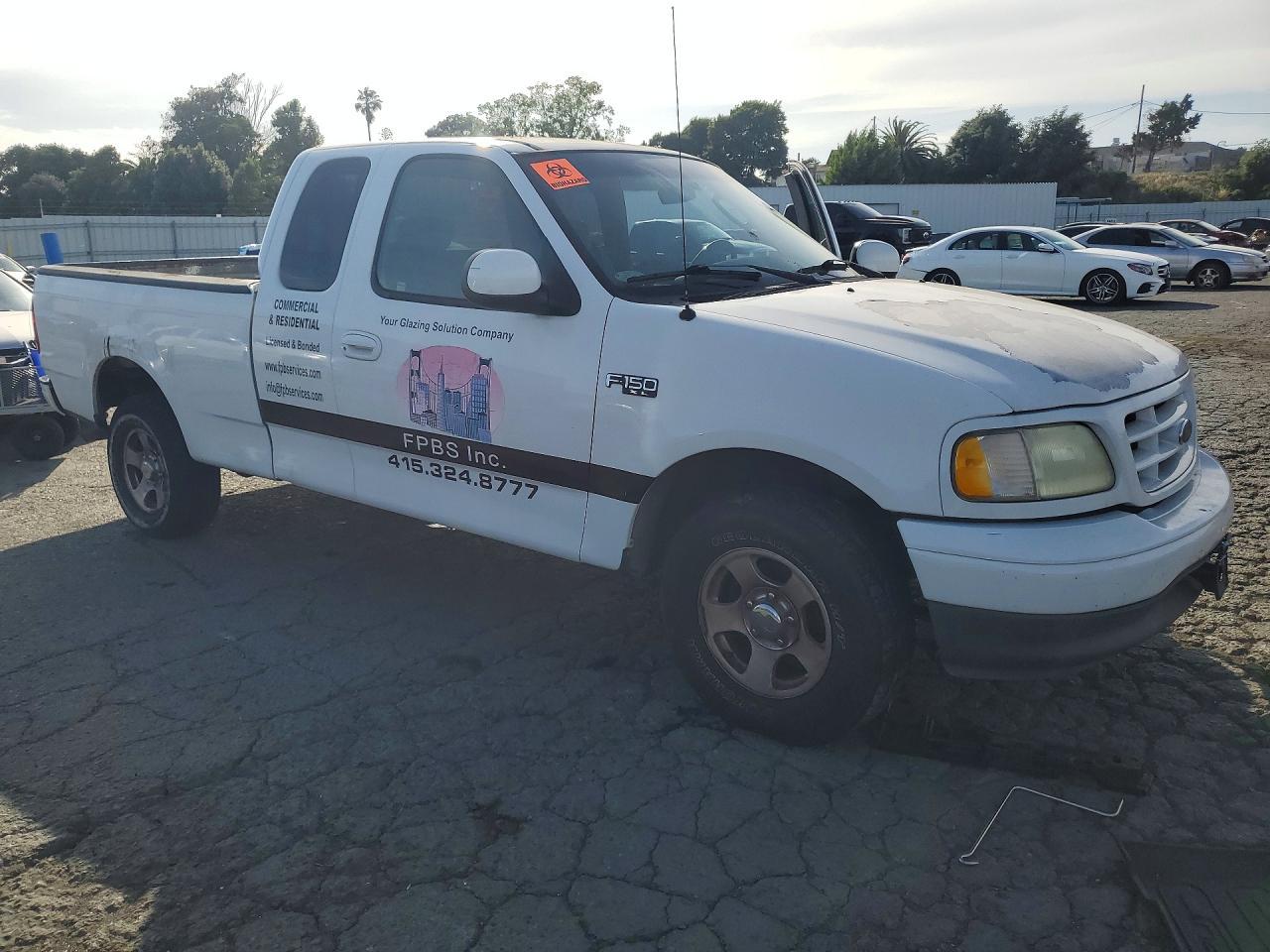 2002 Ford F150 - Фото 4