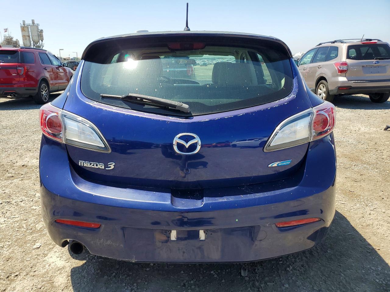 2012 Mazda 323 - Фото 6