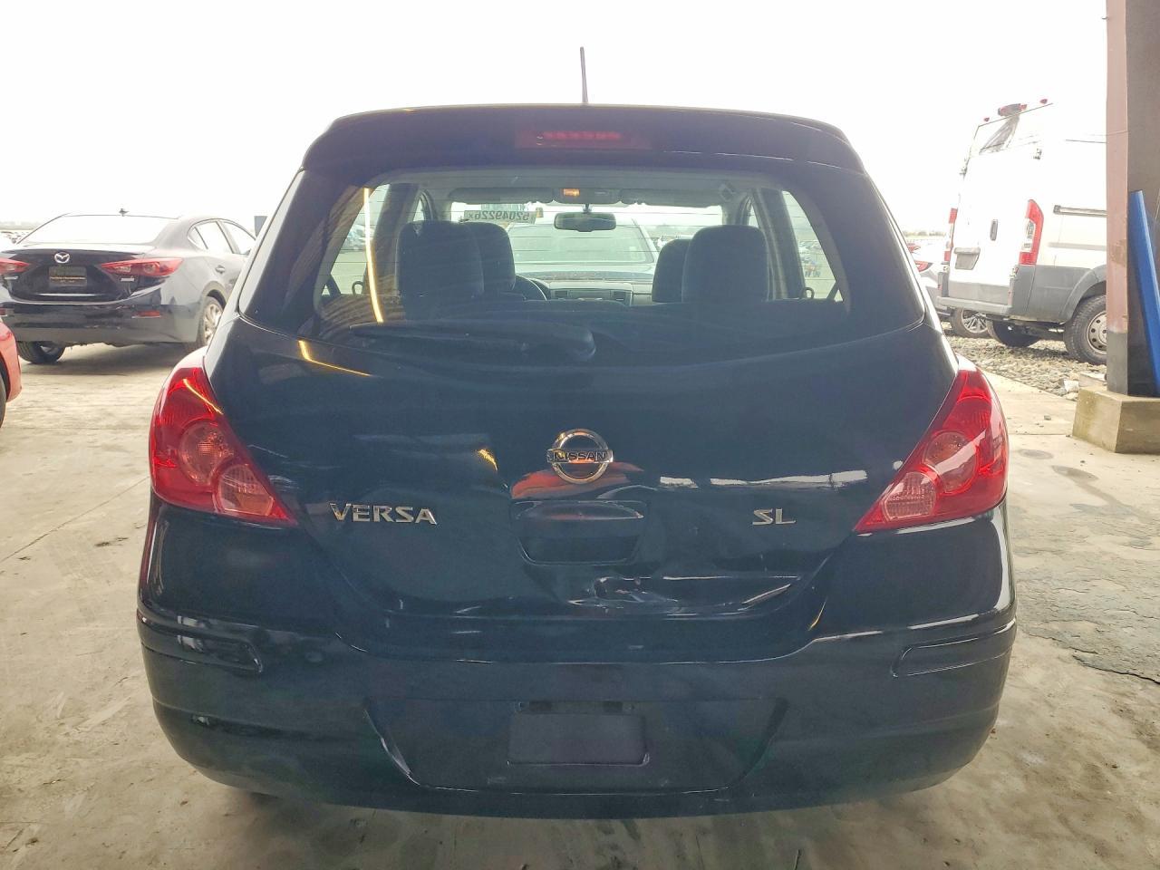2012 Nissan Versa - Фото 6