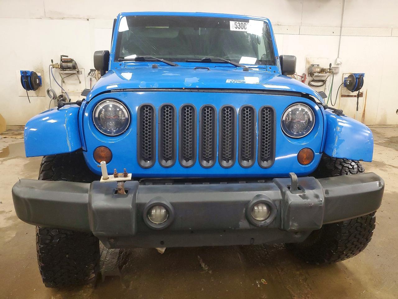 2011 Jeep Wrangler Unlimited Sahara - Фото 5