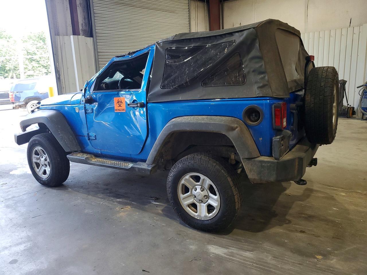 2015 Jeep Wrangler Sport - Фото 2