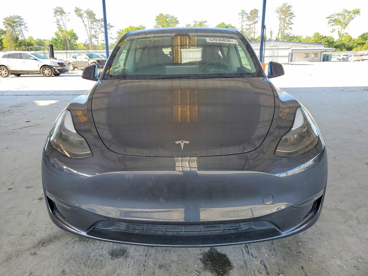 2025 Tesla Model Y - Фото 5