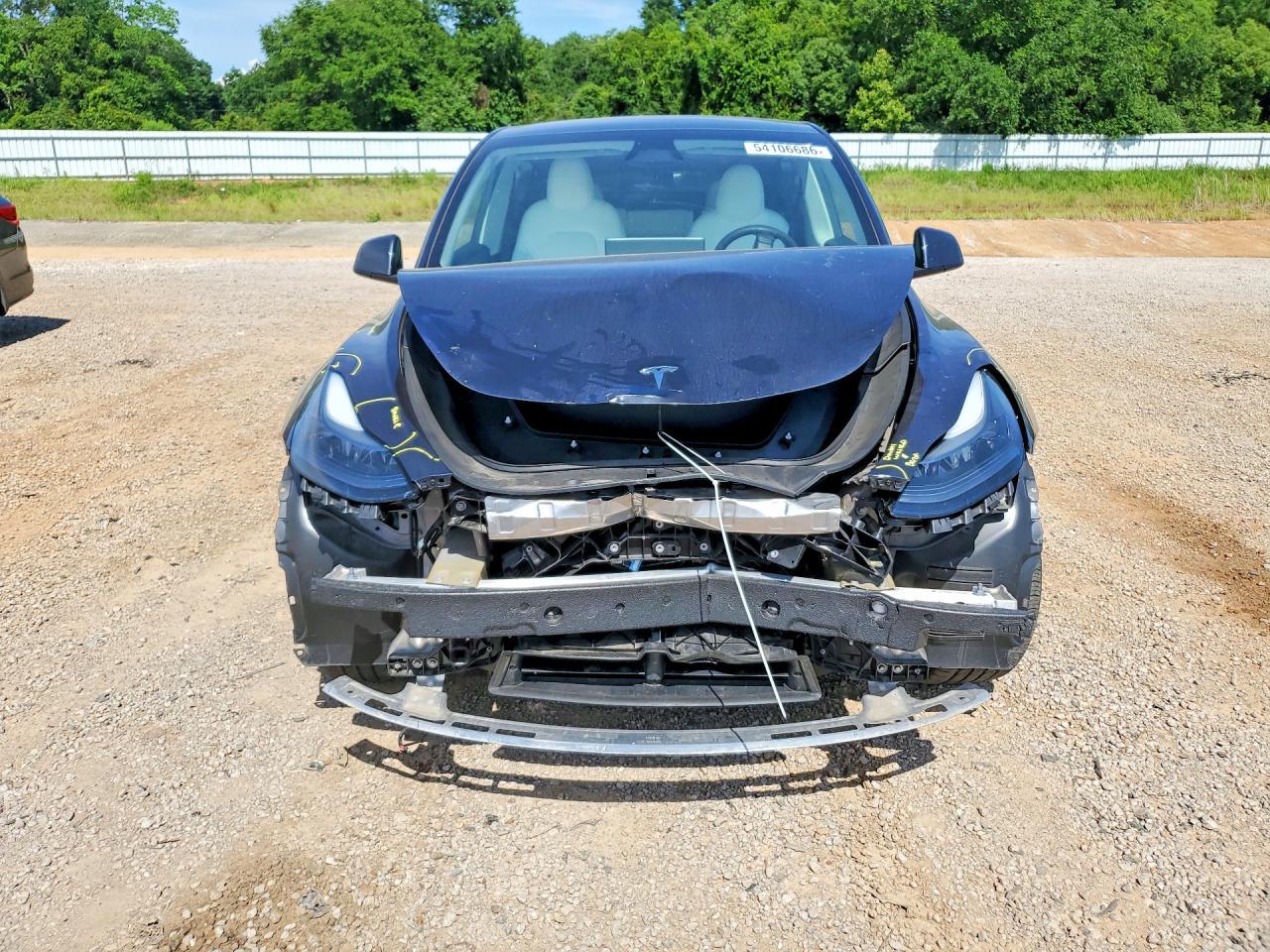 2025 Tesla Model Y - Фото 5