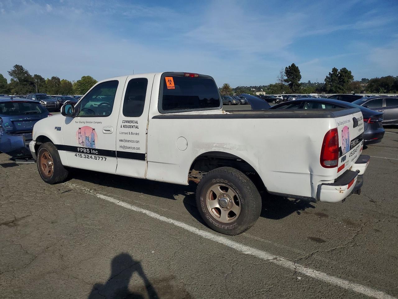2002 Ford F150 - Фото 2