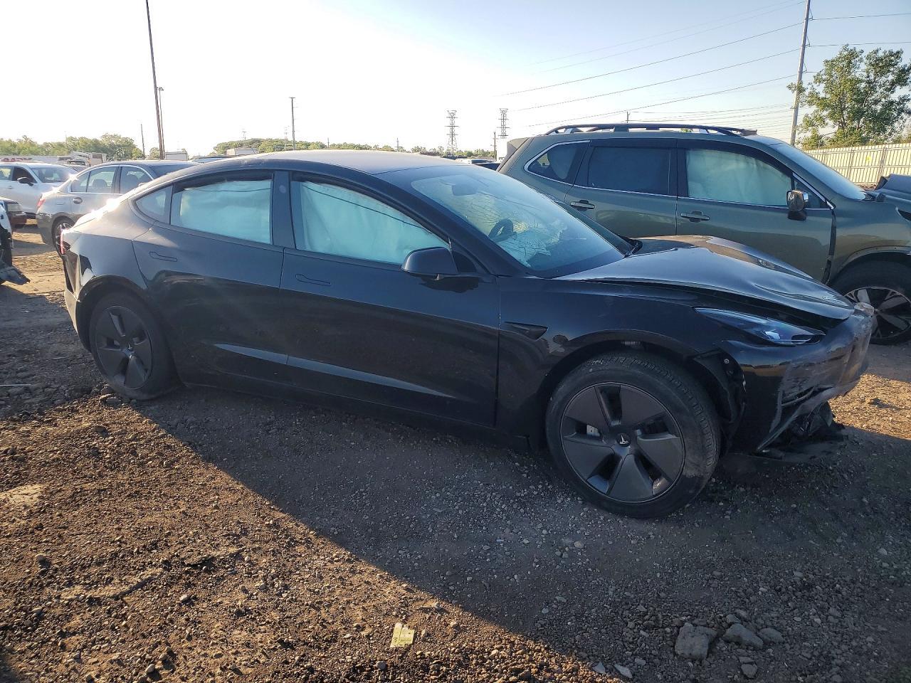 2023 Tesla Model 3 - Фото 4