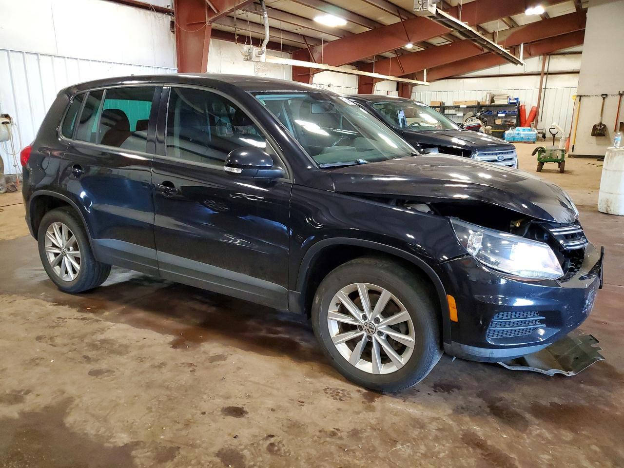 2014 Volkswagen Tiguan S - Фото 4