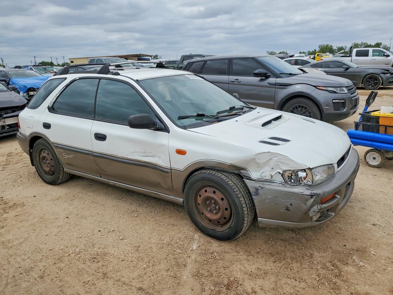 1998 Subaru Impreza Outback - Фото 4