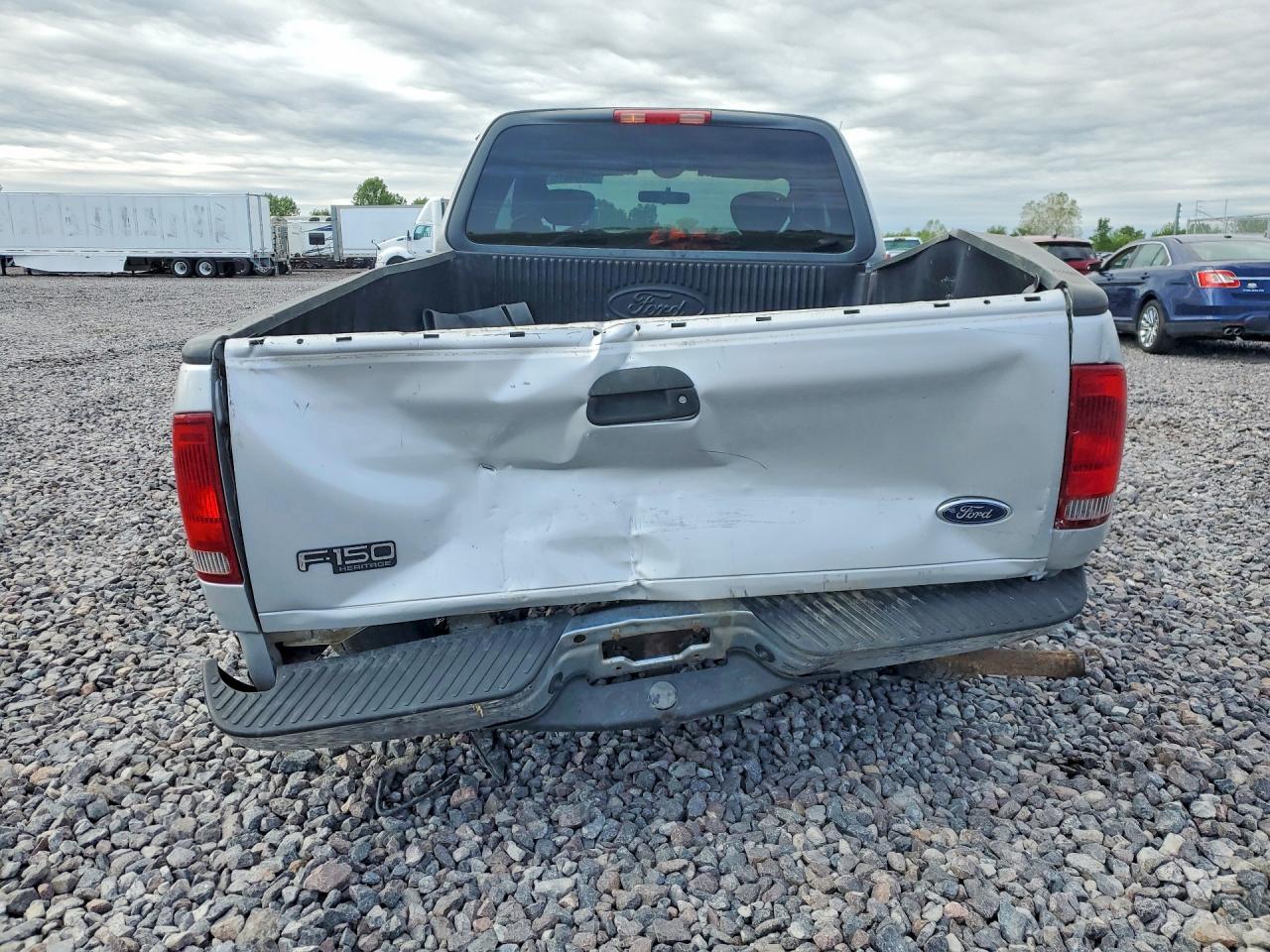 2003 Ford F150 - Фото 6