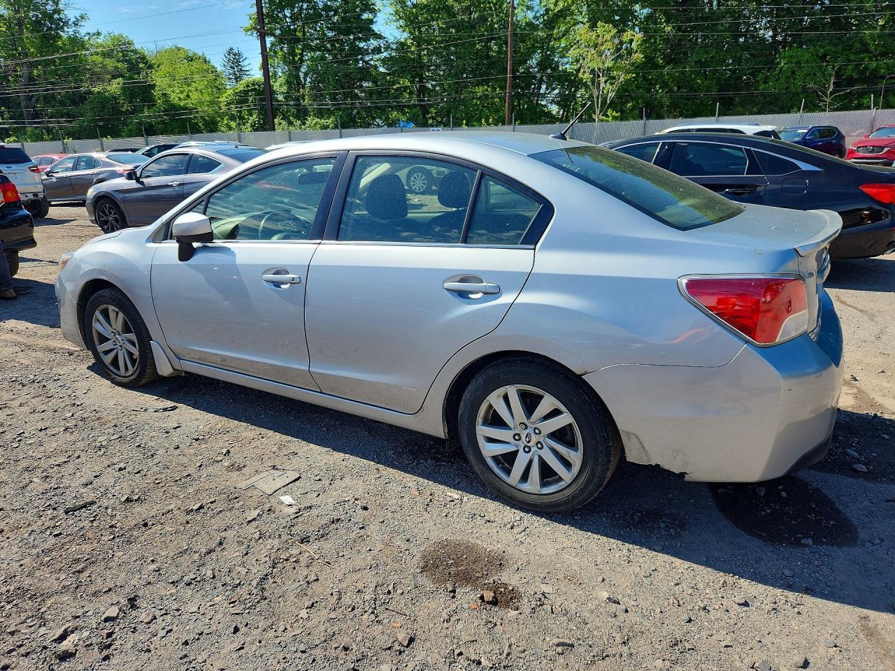 2016 Subaru Impreza Premium - Фото 2