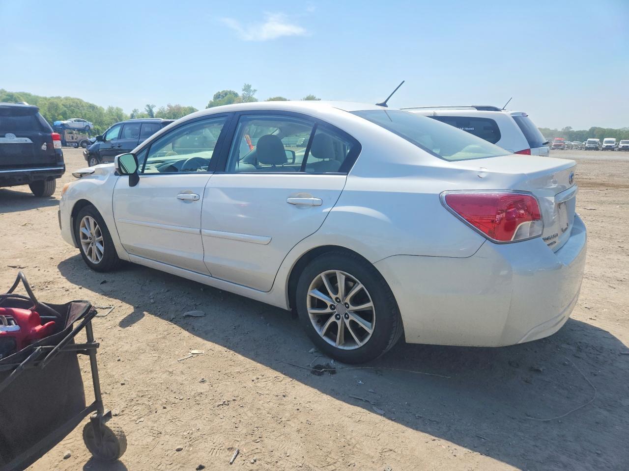 2014 Subaru Impreza Premium - Фото 2