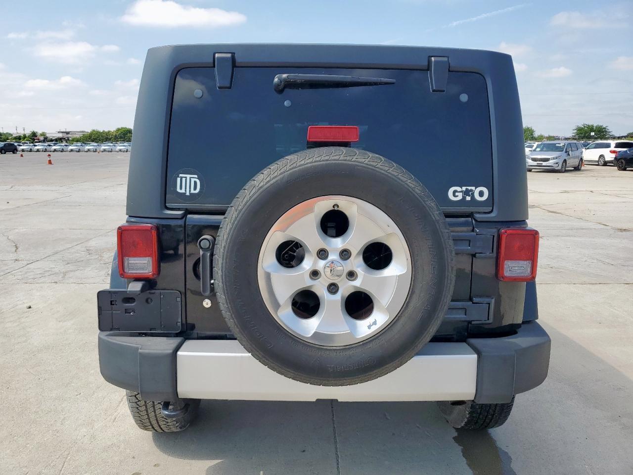 2014 Jeep Wrangler Unlimited Sahara - Фото 6