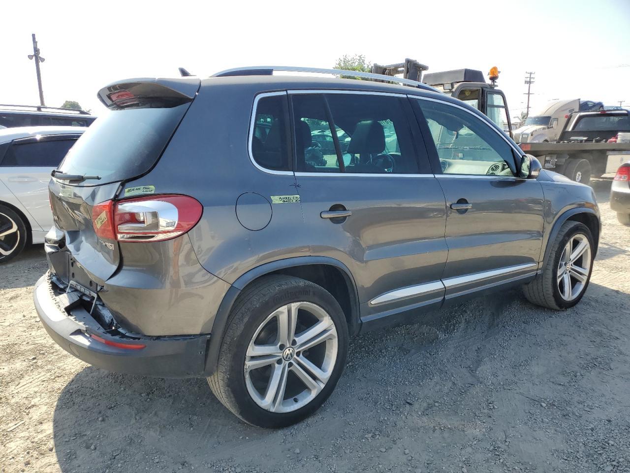 2014 Volkswagen Tiguan S - Фото 3