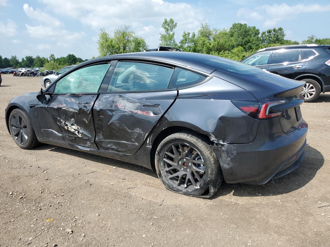 2024 Tesla Model 3 - Фото 2