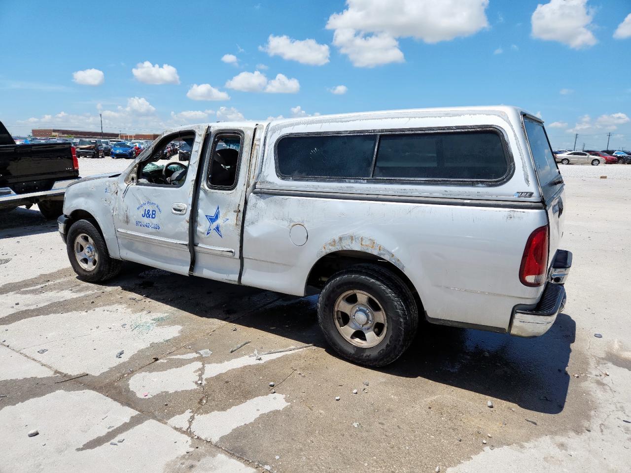 2001 Ford F150 - Фото 2