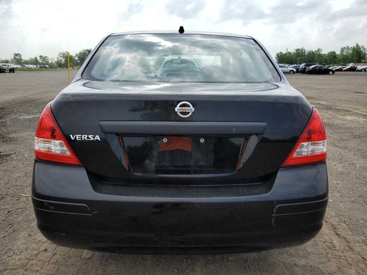 2011 Nissan Versa S - Фото 6