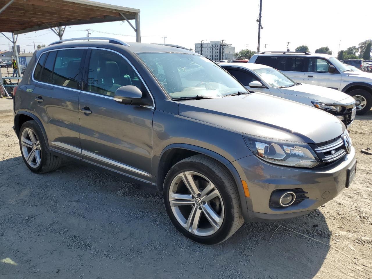 2014 Volkswagen Tiguan S - Фото 4