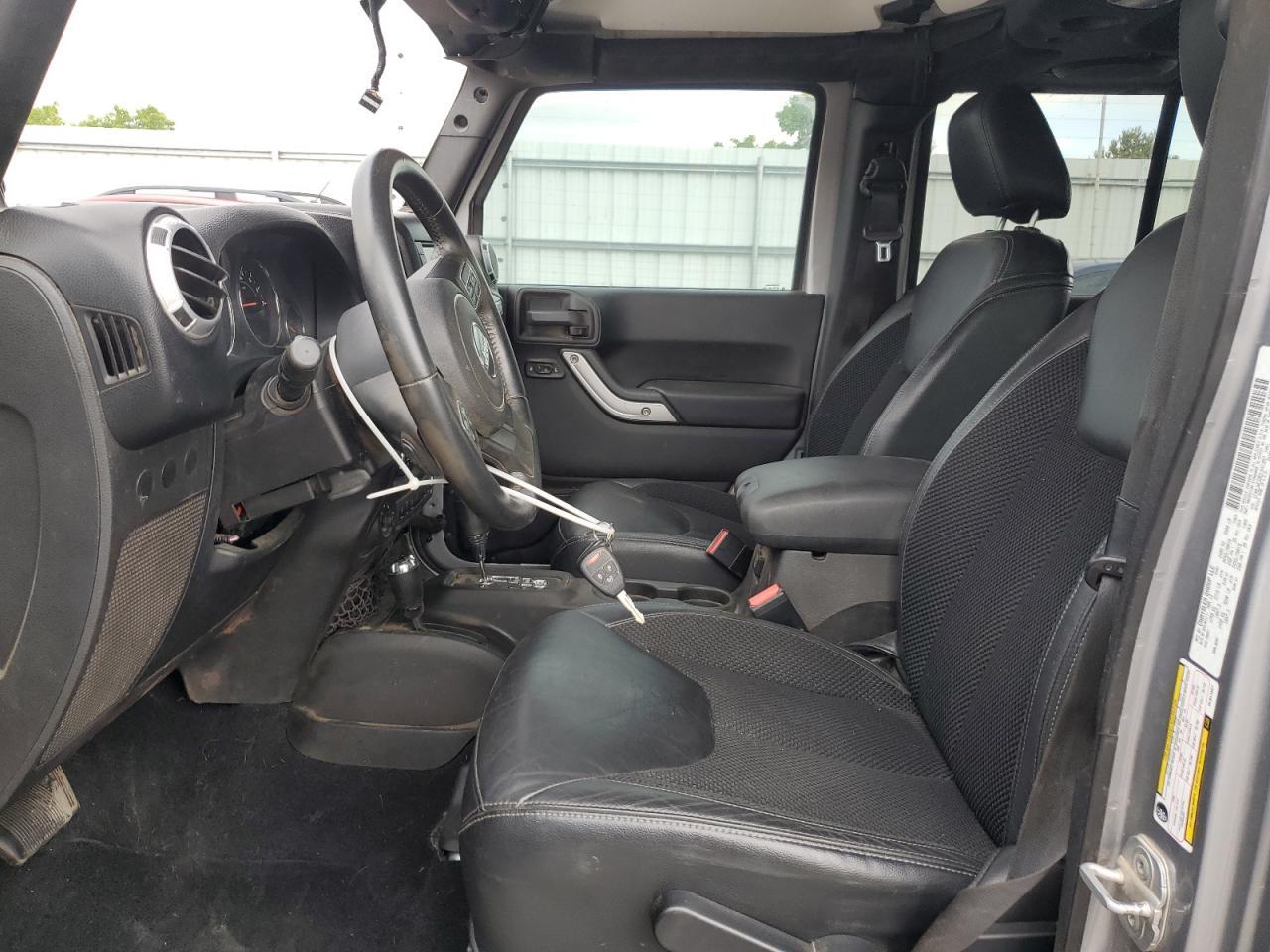 2013 Jeep Wrangler Unlimited Sahara - Фото 7