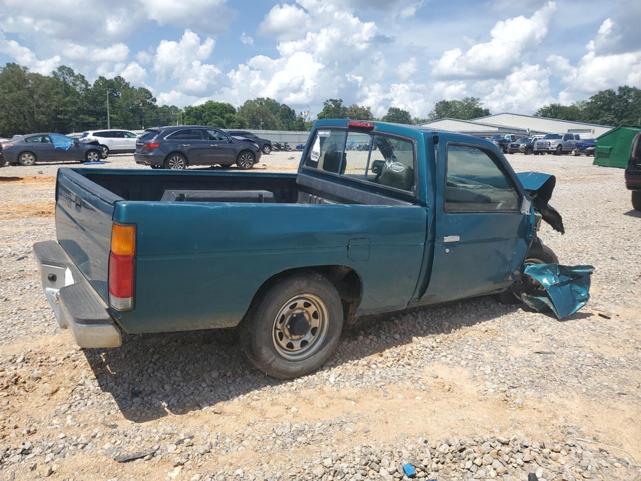 1995 Nissan Truck E/Xe - Фото 3