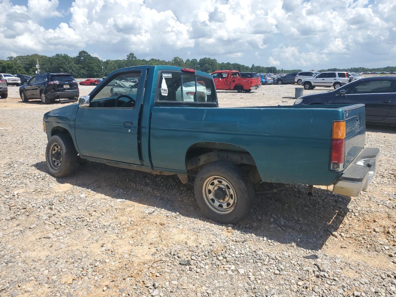1995 Nissan Truck E/Xe - Фото 2