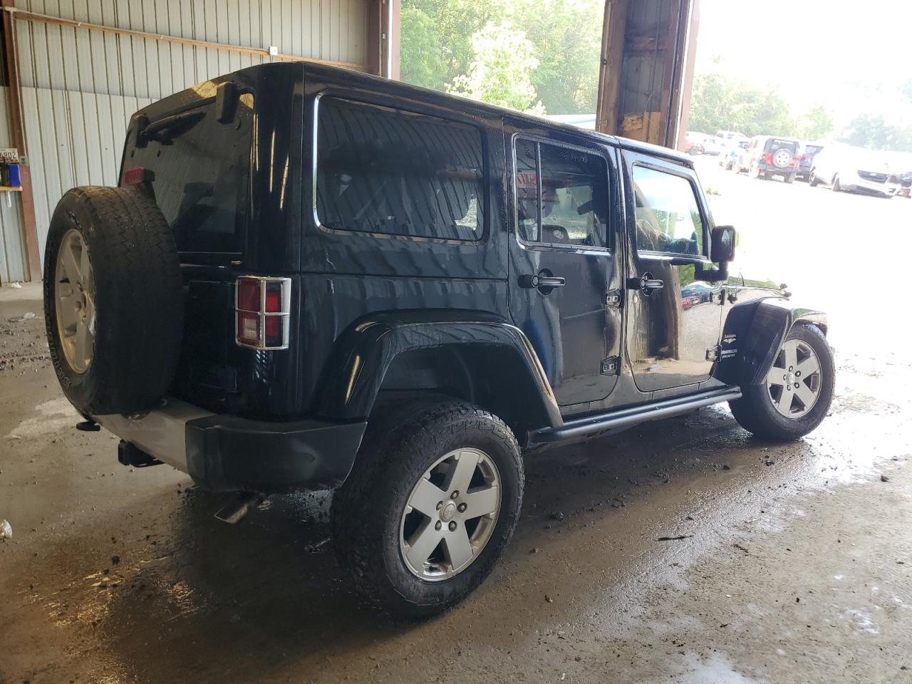 2012 Jeep Wrangler Unlimited Sahara - Фото 3