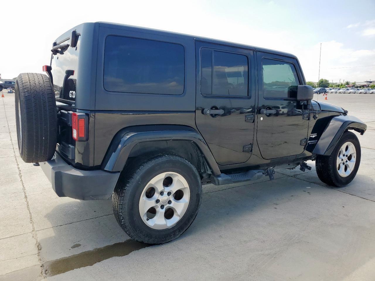 2014 Jeep Wrangler Unlimited Sahara - Фото 3