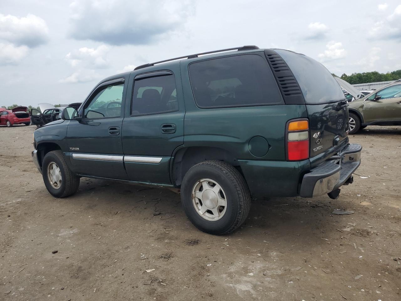 2004 GMC Yukon - Фото 2