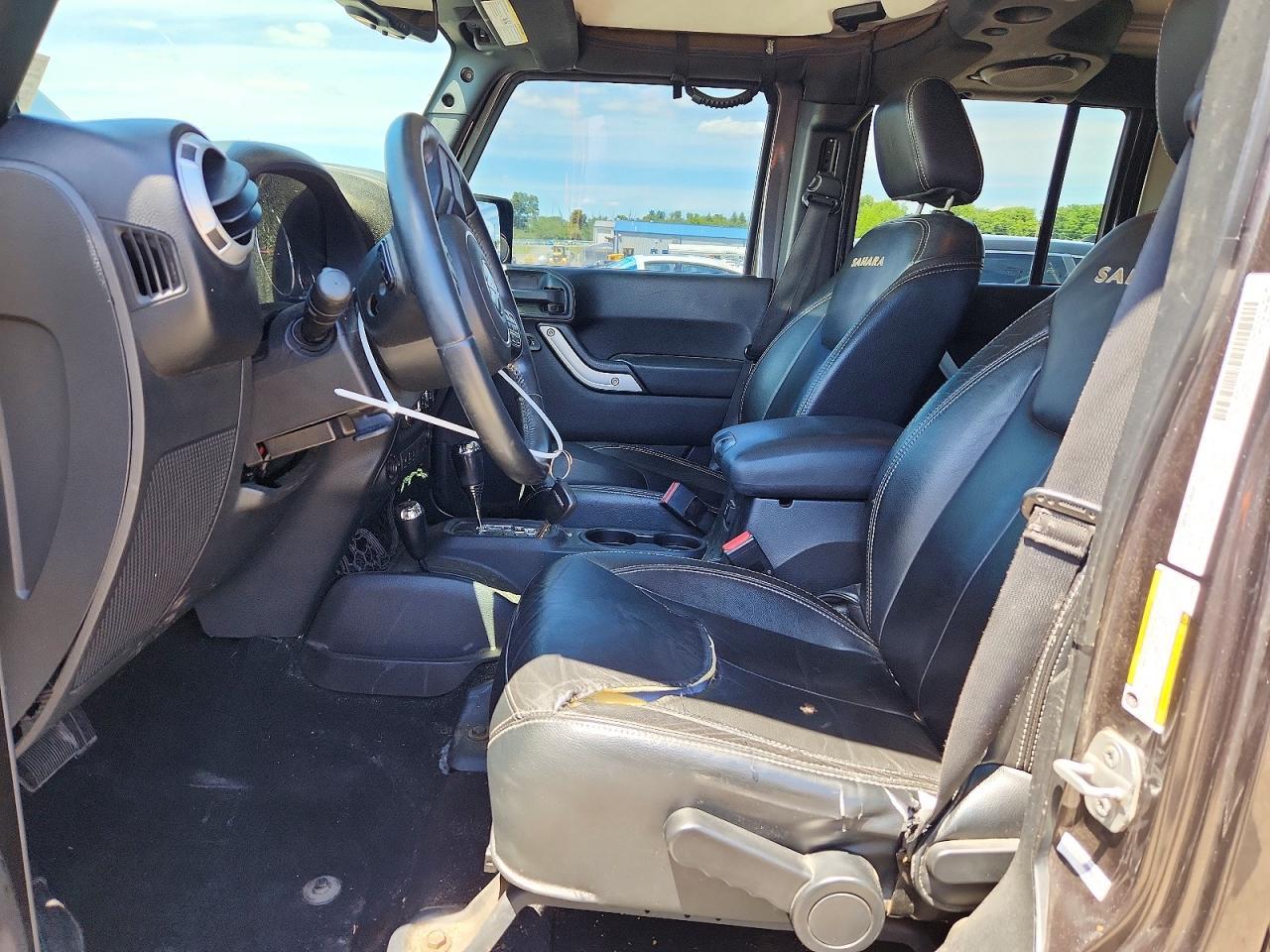 2014 Jeep Wrangler Unlimited Sahara - Фото 7