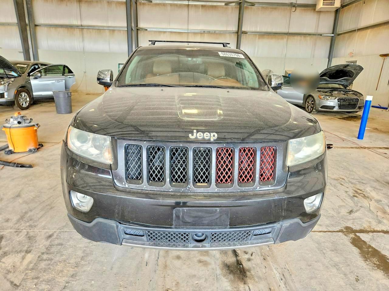 2011 Jeep Grand Cherokee Overland - Фото 5