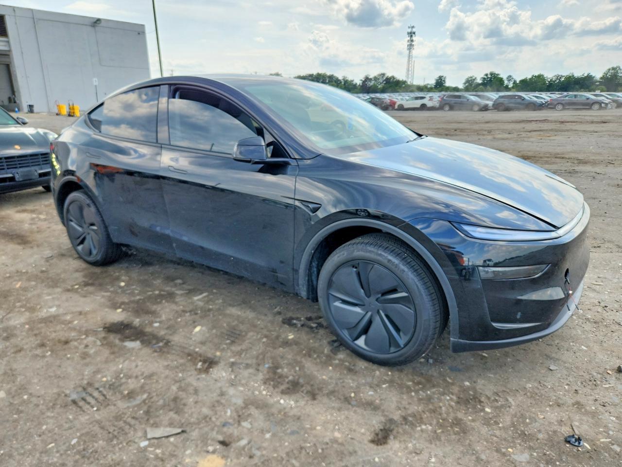 2026 Tesla Model Y - Фото 4