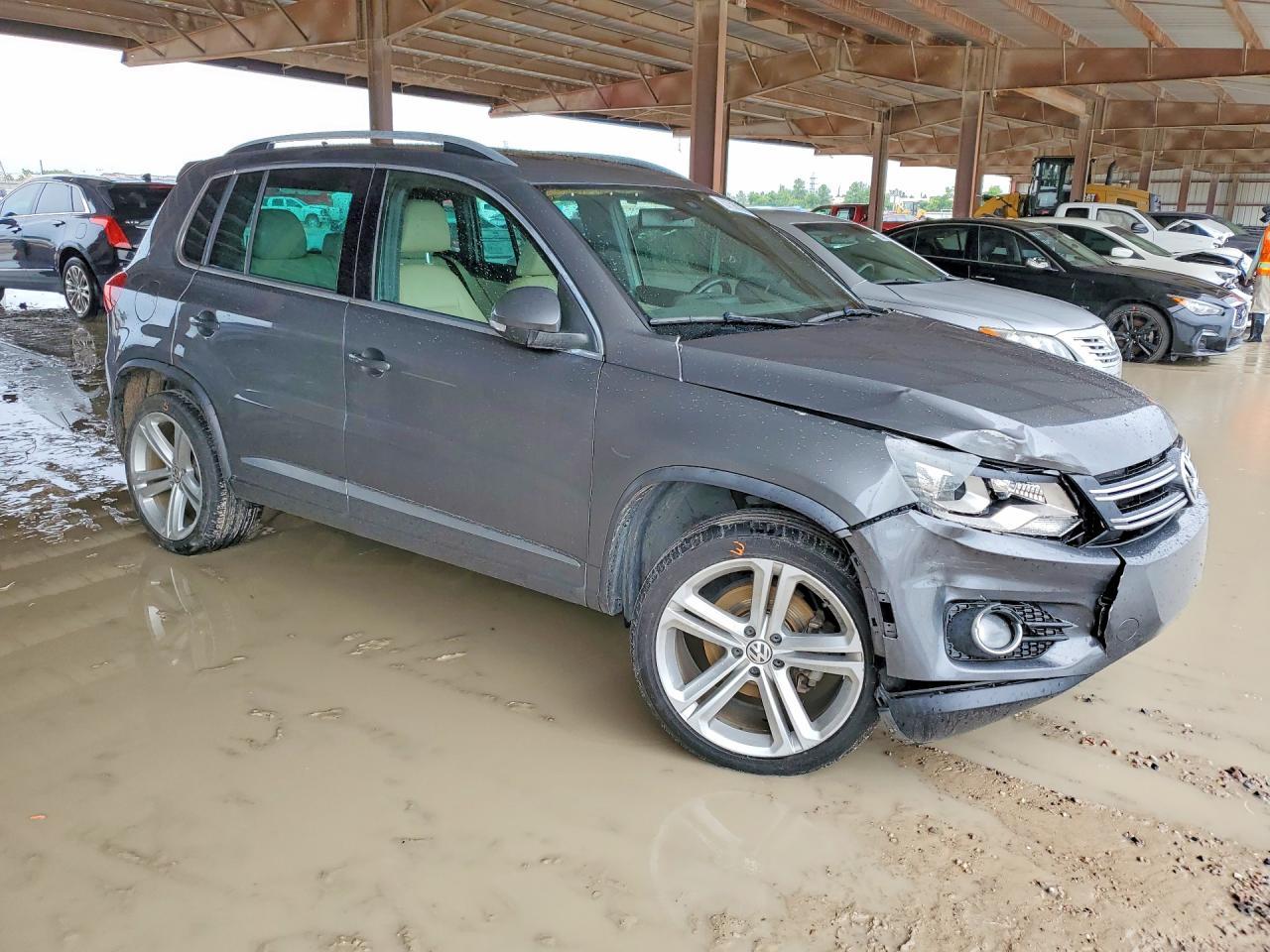 2014 Volkswagen Tiguan S - Фото 4