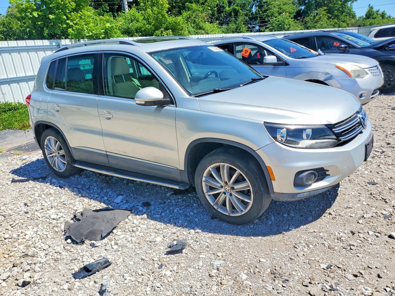 2014 Volkswagen Tiguan S - Фото 4