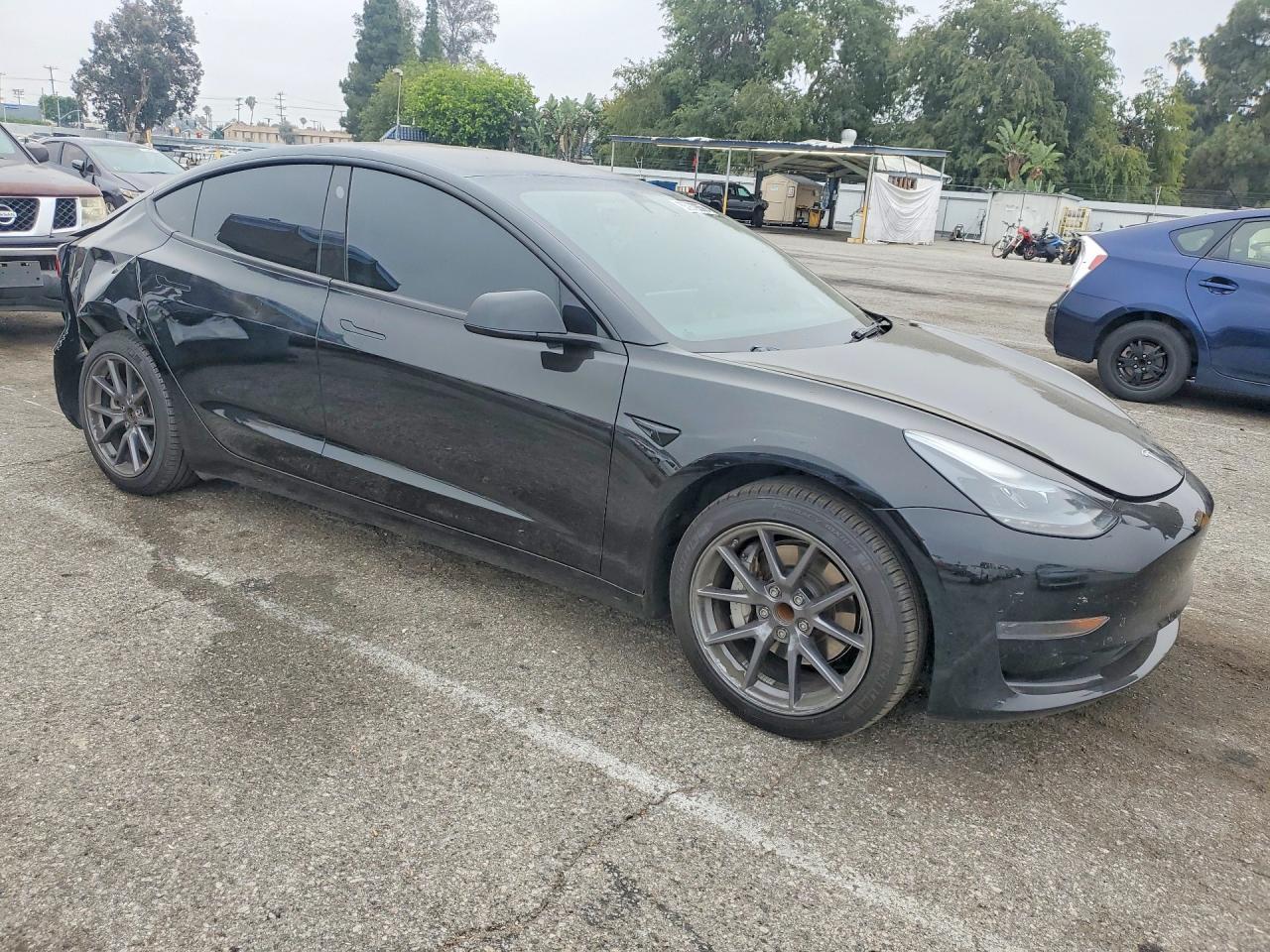 2023 Tesla Model 3 - Фото 4