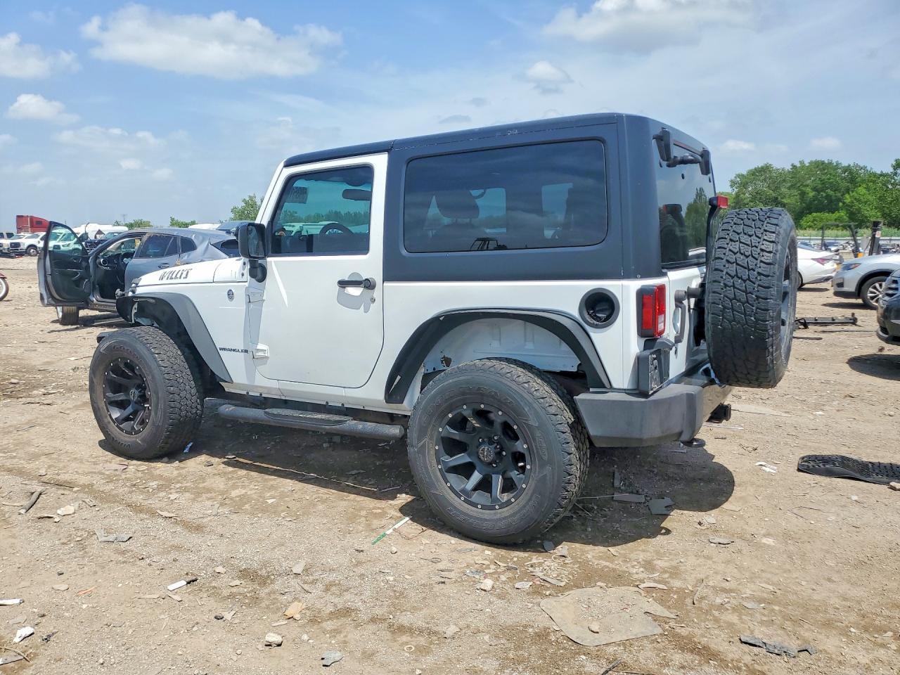 2015 Jeep Wrangler Sport - Фото 2